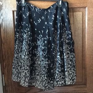 Jones New York petite collection, skirt and matching top. Each has black lining